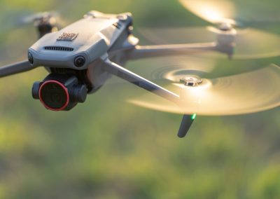 Drone,Aircraft,With,Blurred,Fast,Rotating,Propellers,And,Video,Camera