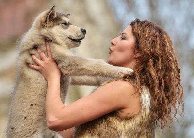 Woman,With,Dog,Alaskan,Malamute