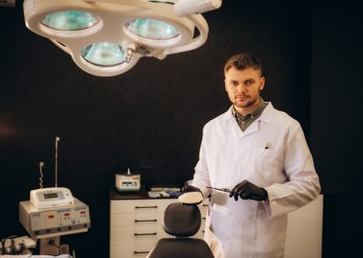 A Florida man was caught red-handed using one trick that left hospital bosses speechless Doctor,Holding,Silicone,Implant,For,Breast,Augmentation,,Space,For,Text.