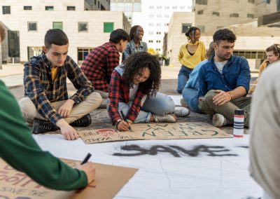 Florida’s Attorney General delivered one warning to schools that has Democrat educators fuming Group,Of,Multicultural,Young,People,Sitting,In,Urban,Campus,,Creating