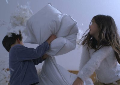 Adorable,Little,Boy,And,Sweet,Small,Girl,In,Pillow,Fight,