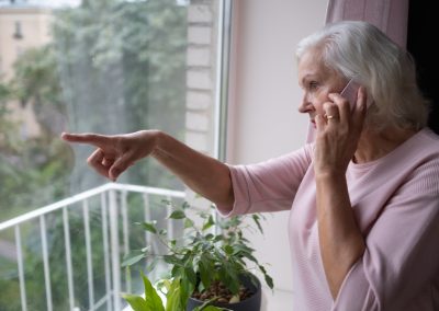 Senior,Woman,Talking,On,Phone,Listening,And,Hearing,To,Rumor