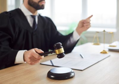 Man,Judge,Knocking,Gavel,Having,Court,Verdict,Sitting,At,The