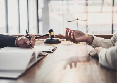 Male,Lawyer,Or,Judge,Consult,Having,Team,Meeting,With,Businesswoman