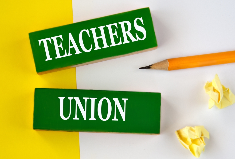 Teachers,Union,-,Words,On,Wooden,Green,Blocks,On,A