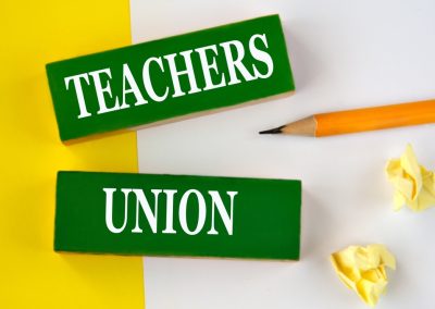 Teachers,Union,-,Words,On,Wooden,Green,Blocks,On,A