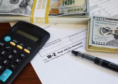 Ron DeSantis destroyed a Seattle columnist's millionaire tax myth with one fact W-2,Tax,Form,Close,Up,With,Calculator,,Money,And,Pen