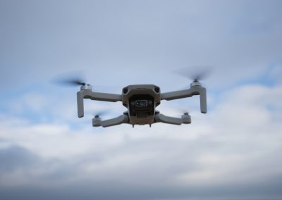 Closeup,Of,Small,Remotely,Controlled,Drone,With,Camera,Hovering,Over
