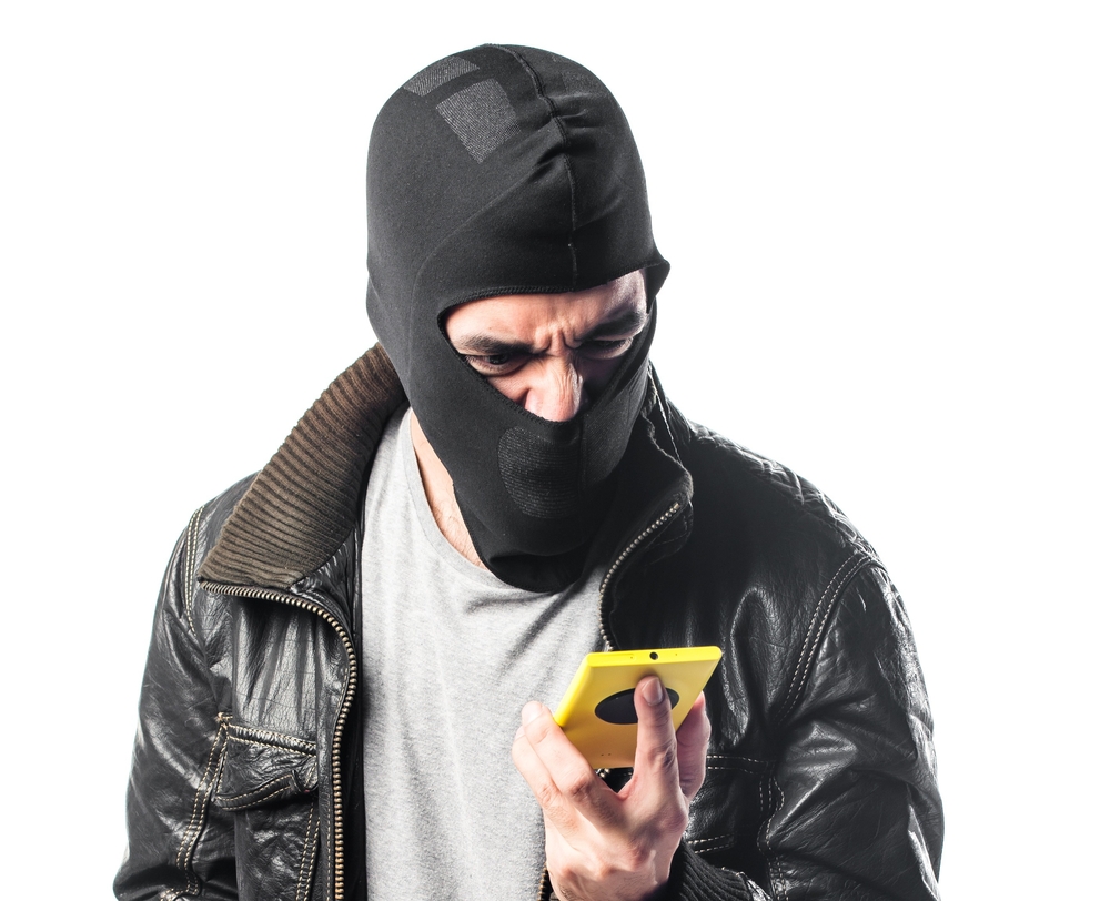 Robber,Talking,To,Mobile