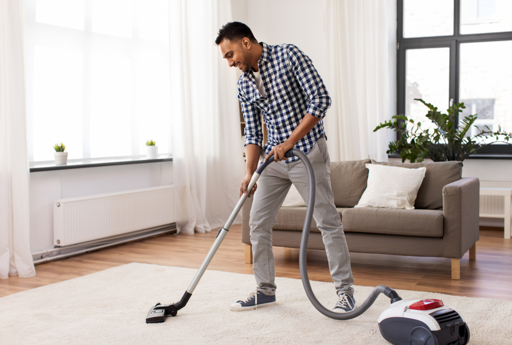 Household,And,Cleaning,Concept,-,Indian,Man,With,Vacuum,Cleaner