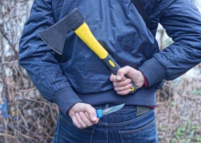 One,Man,In,Blue,Clothes,Hides,His,Hand,With,A