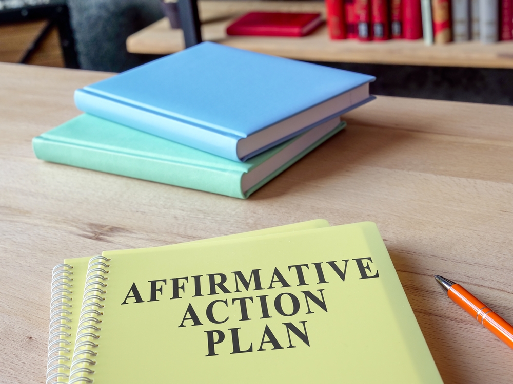 Affirmative,Action,Plan,Aap,With,Other,Papers,On,The,Desk.