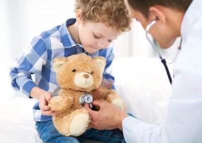 Doctor,And,Child,Patient.,Physician,Examines,Little,Boy,By,Stethoscope.