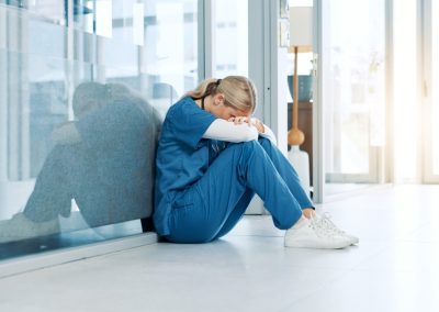 A Florida nurse just lost everything after this TikTok about Karoline Leavitt went viral Healthcare,,Nurse,And,Stress,On,Floor,In,Hospital,Hallway,With