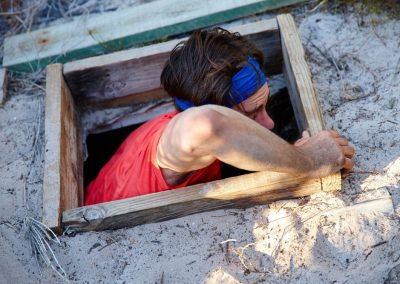 Man,,Ground,And,Climbing,Hole,Of,Tunnel,For,Illegal,Immigration,