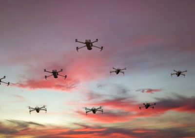 Group,Of,Surveillance,Drones,In,Front,With,Sunset,Sky,Scene