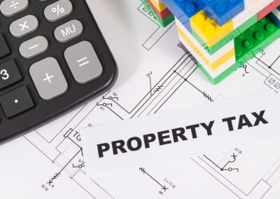 Inscription,Property,Tax,,Calculator,,Small,House,Made,Of,Colorful,Toy