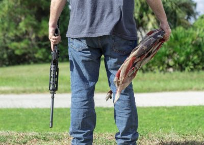 Conservative,Caucasian,Man,Holding,Ar-15,Automatic,Assault,Rifle,And,American