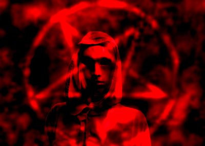 Satanic,Priest,In,Red,Background