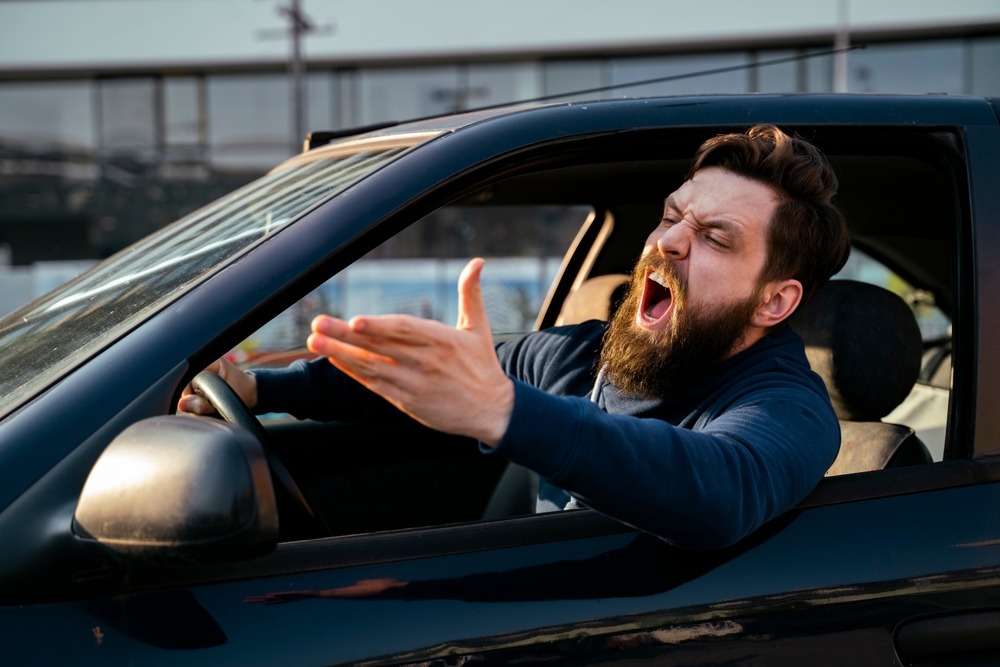 Bearded,Young,Man,Road,Raging,,,Yelling,From,The,Car