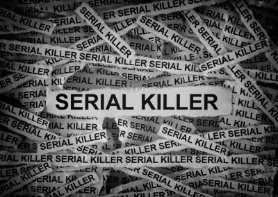 Strips,Of,Newspaper,With,The,Words,Serial,Killer,Typed,On