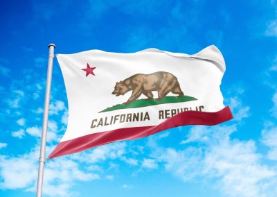 California,Flag,Waving,In,The,Wind,,Blue,Sky,Background