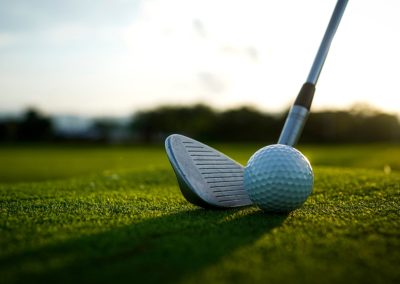 A,Close-up,View,Of,A,Golf,Club,Positioned,Beside,A