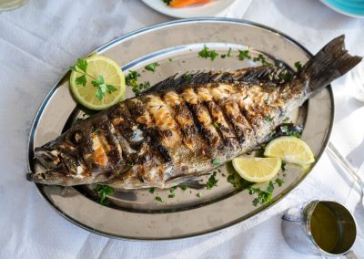 Ron DeSantis Just Named This Naples Restaurant Home to Florida's Best Grouper Sandwich Grilled,Grouper,Fish,On,A,Silver,Plate,In,A,Restaurant