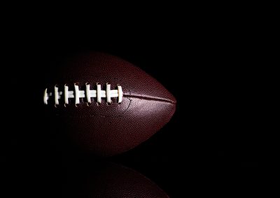 American,Football,Ball,Isolated,On,Black,Background