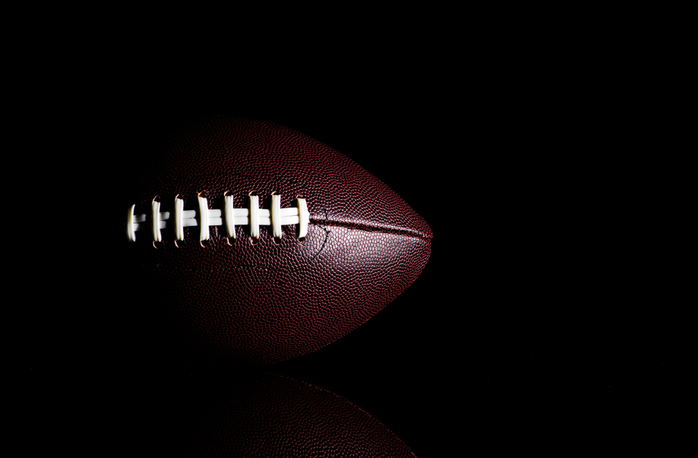 American,Football,Ball,Isolated,On,Black,Background