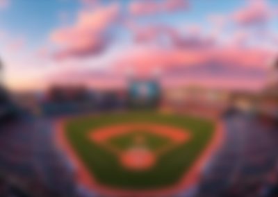 Blurred,Image,Of,A,Professional,Baseball,Stadium,At,Sunset,With