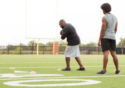 American,Football,Coach,Training,An,Athlete.