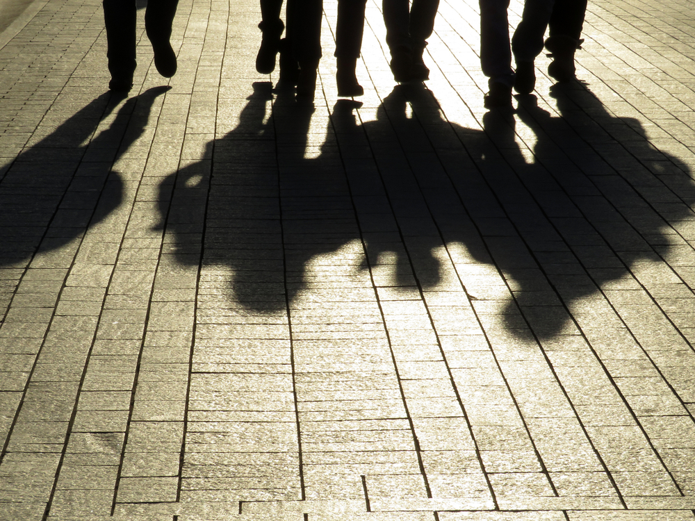 Silhouettes,And,Shadows,Of,People,On,The,Street.,Crowd,Walking