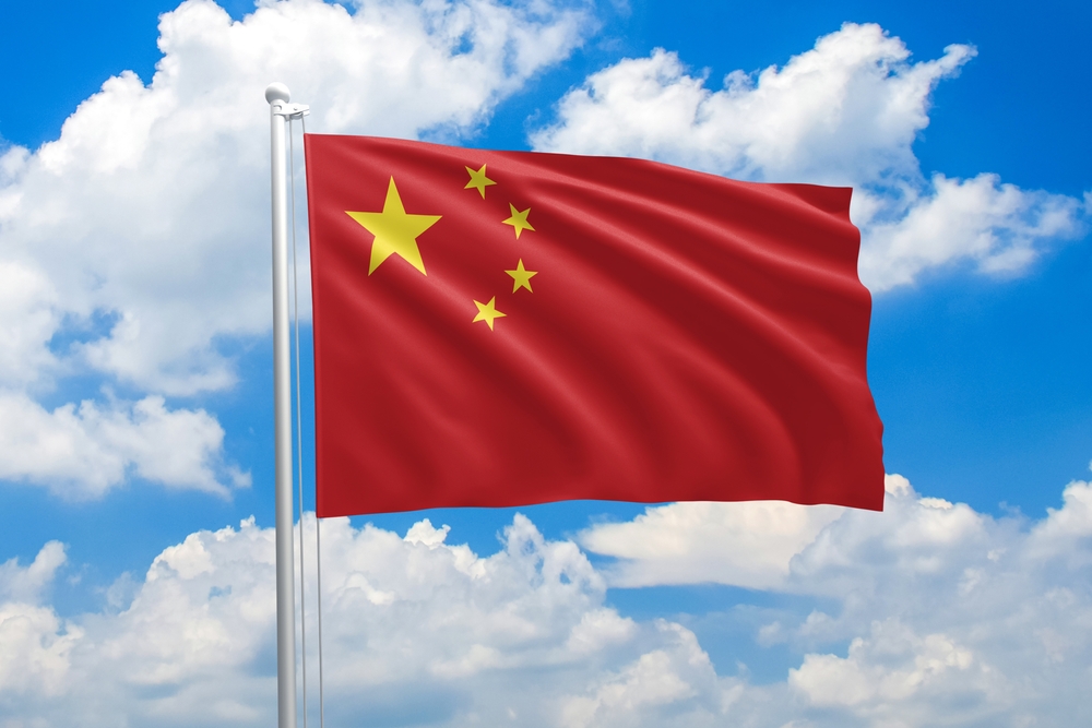 China,National,Flag,Waving,In,The,Wind,On,Clouds,Sky.