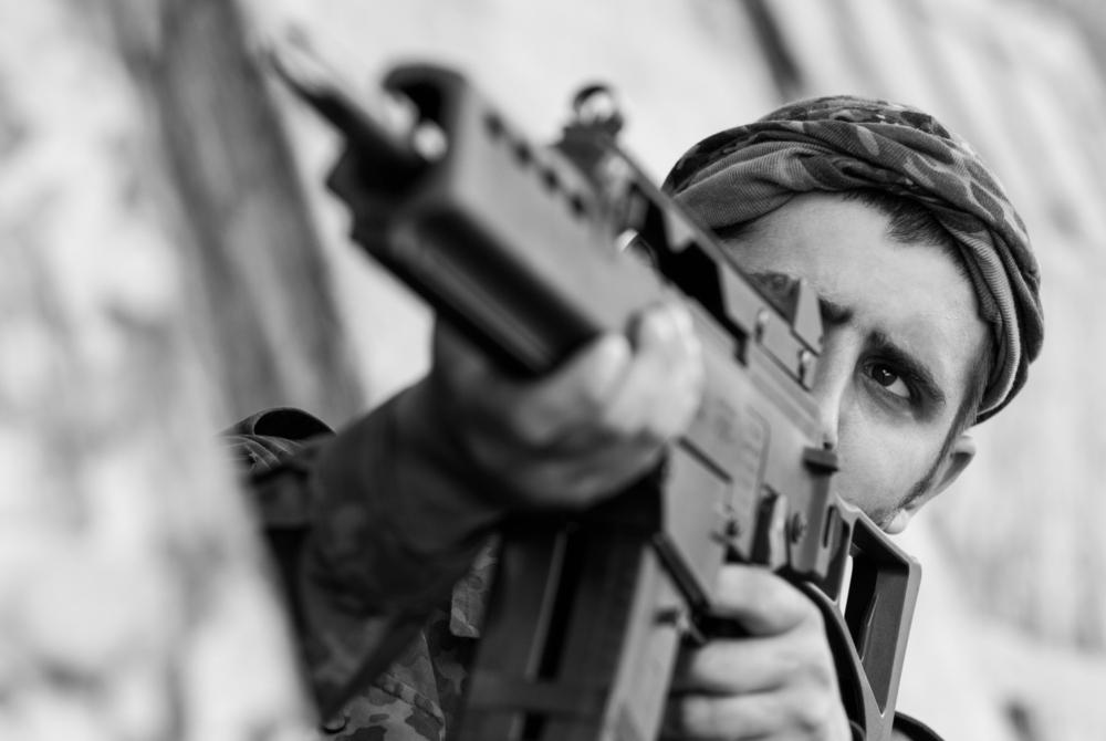 Black,And,White,Photo,Of,Armed,&,Dangerous,Soldier,Shooting