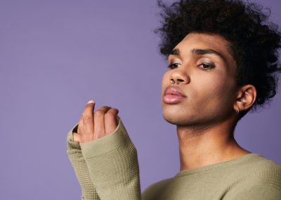 Close,Up,Portrait,Of,Latin,American,Brunette,Male,With,Afro