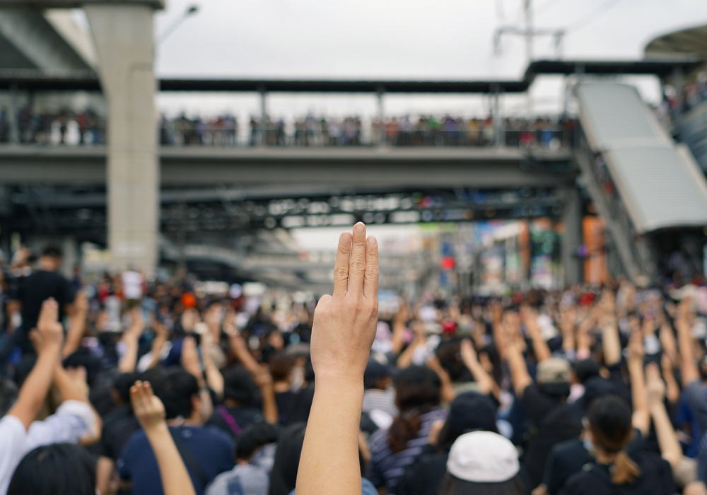 Thai,Protesters,Showing,A,Three-finger,Salute,As,They,Gather,Demanding