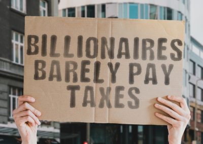 The,Phrase,”,Billionaires,Barely,Pay,Taxes,”,On,A