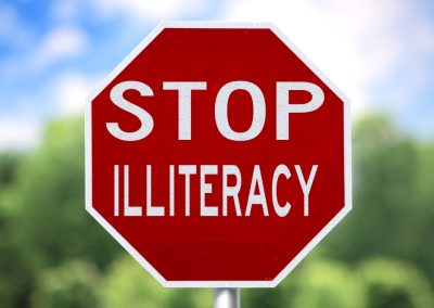 Creative,Sign,-,Stop,Illiteracy