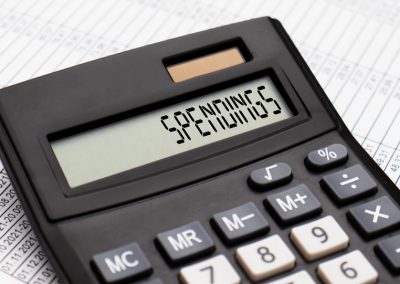 A,Calculator,With,The,Word,Spendings,On,The,Display
