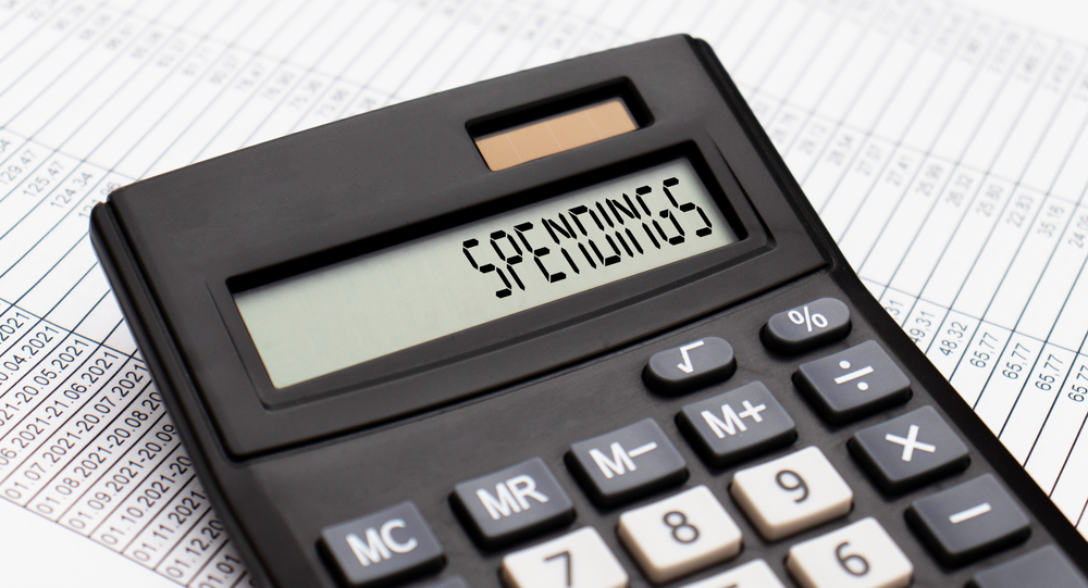A,Calculator,With,The,Word,Spendings,On,The,Display