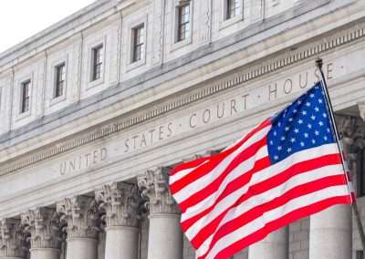 Usa,National,Flag,Waving,In,The,Wind,In,Front,Of