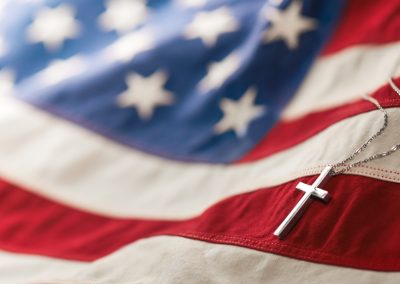 Christian,Cross,Necklace,On,American,Flag.,For,Us,Memorial,Day,
