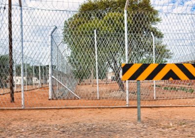 Chain-link,Security,Fence,With,Razor,Wire,Protects,A,Restricted,Area