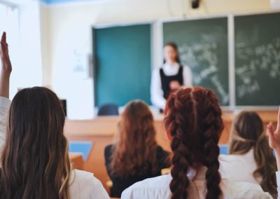 Casey DeSantis Just Made Florida the Only State Where Teachers Get Certified to Build Tougher Kids Intelligent,Group,Of,Young,School,Children,All,Raising,Their,Hands