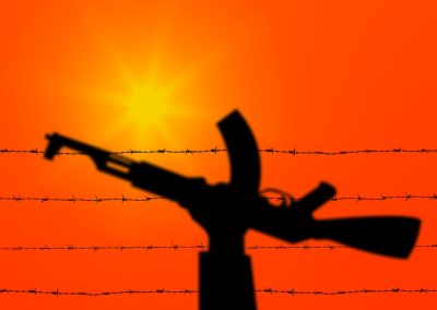 Ron DeSantis Refused to Let CAIR Walk Free and Now They Are Begging a Judge to Save Them Palestine,And,Israel,Conflict.,Hand,Holding,Gun,Over,Barbed,Wire.