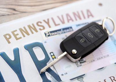 Remote,Control,Car,Keys,On,Pennsylvania,License,Plate,With,Driver