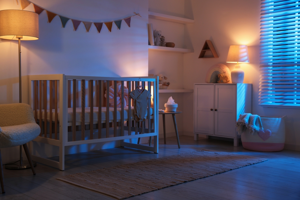 Stylish,Baby’s,Room,With,Crib,And,Dresser,At,Night.,Interior