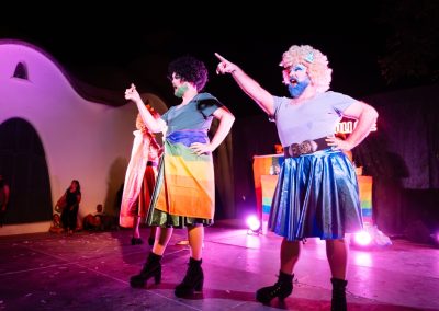 Drag,Queens,Wearing,Colorful,Costumes,And,Rainbow,Flags,Are,Performing