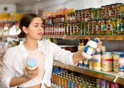 A Florida Woman Threw Vegan Mayo at a Stranger and Got Caught a Month Later at a Strip Mall Smiling,Young,Girl,Shopping,For,Groceries,In,Supermarket,,Choosing,Light